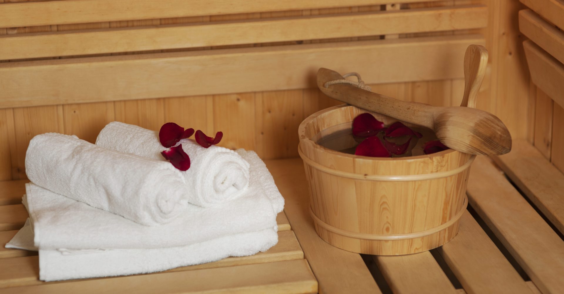 Sauna bucket with rose petals